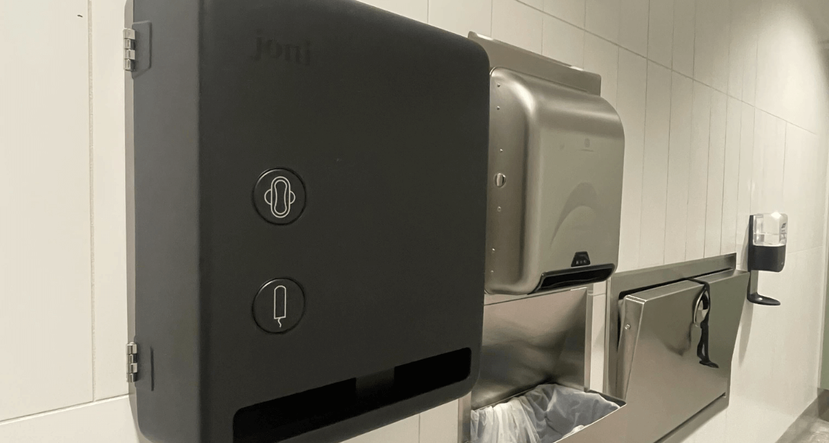 joni Model V period care dispenser in a bathroom at YYJ