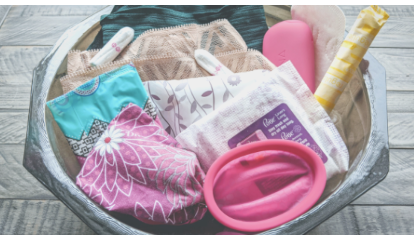 Basket of alternative period care options that are sustainable options to plastic disposable period care