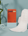 joni bamboo overnight pads for heavy flow displayed with packaging, showcasing ultra-thin and ultra-absorbent design.