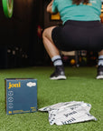 Organic bamboo incontinence pads by joni on gym floor, promoting comfort during workouts.