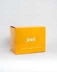 Yellow bulk box of joni regular pads for commercial washrooms