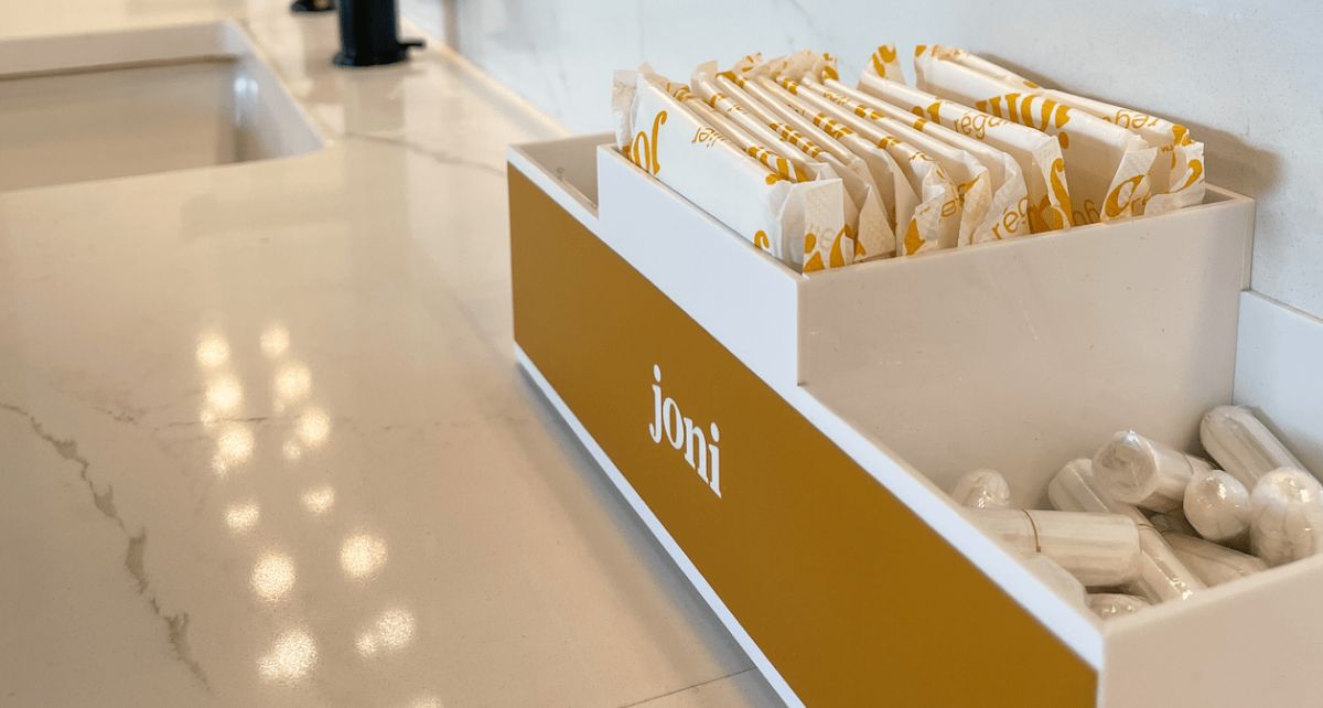 period care organizer in a public washroom filled with joni period care