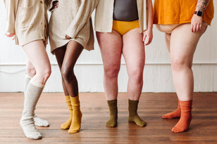 Four diverse pairs of legs represent inclusive and equitable period care as part of joni's mission