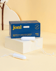 joni super tampons with packaging on a beige background